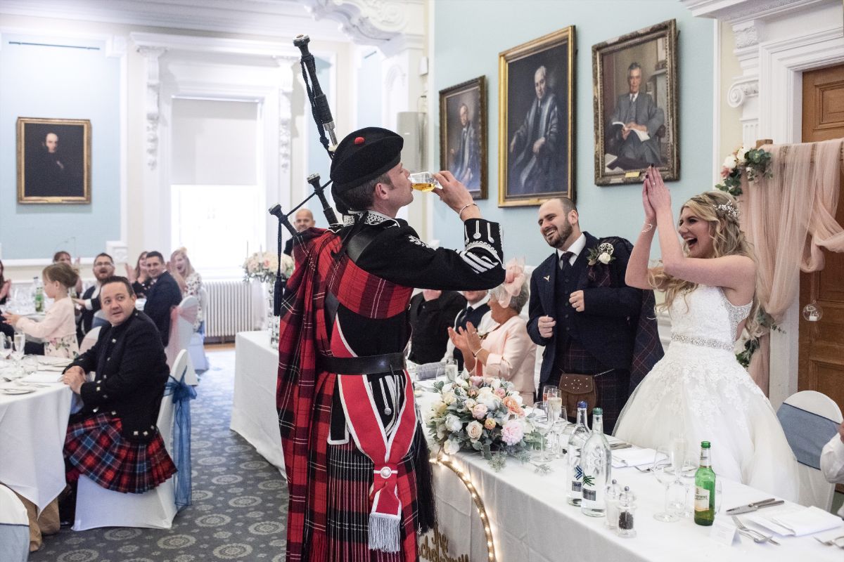 The Scottish tradition of the bride pouring a dram for the piper is well received by all.