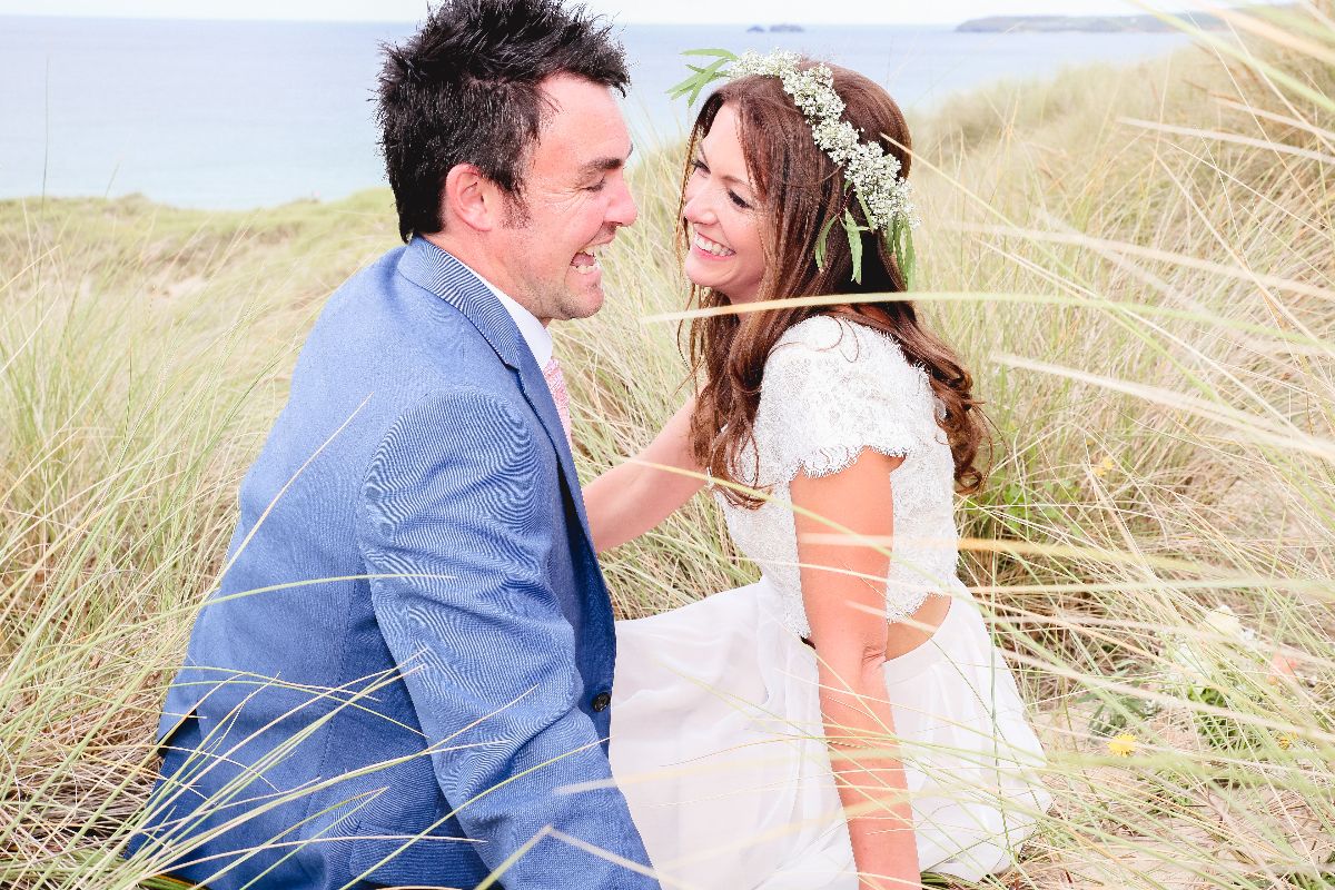 Esther & Ben having fun in the sand dunes at Hayle Towans