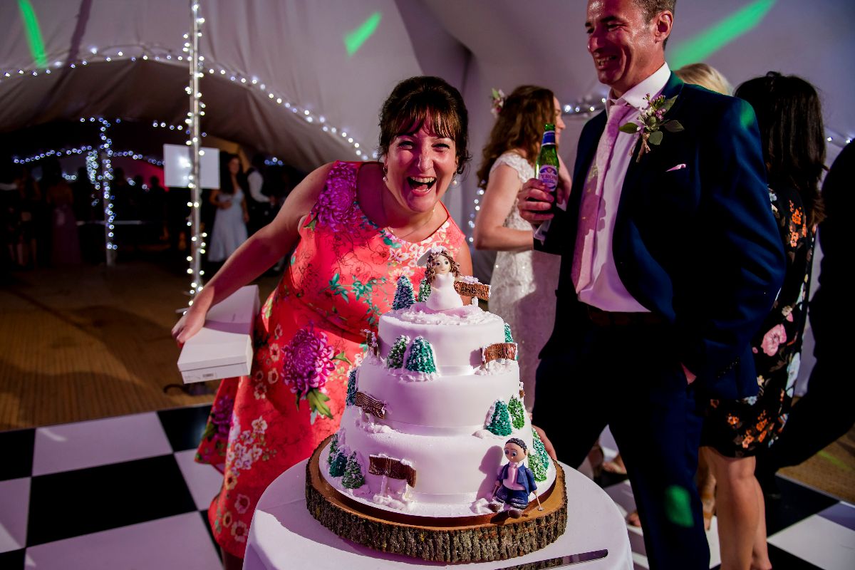 Amazing ski themed wedding cake, made by Nina Hale (who happened to be my best women)- posing with her creation!