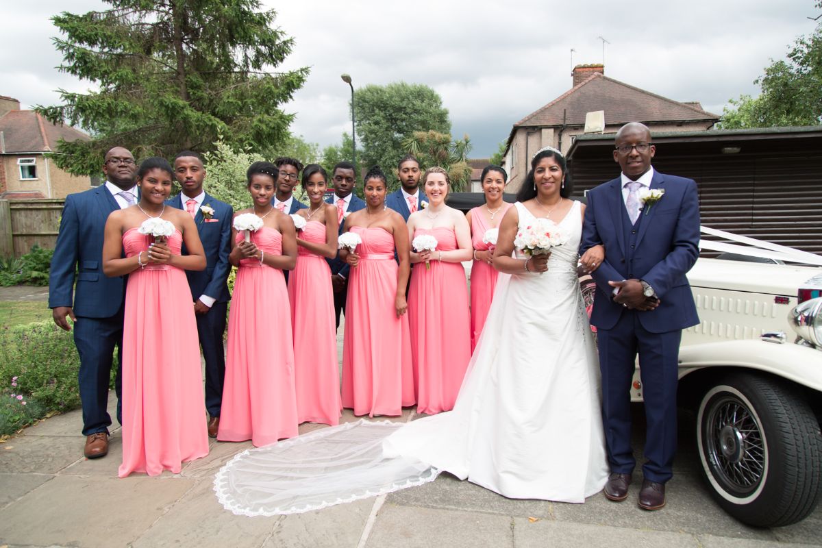Chris and Angela with the Bridesmaids and Groomsmen