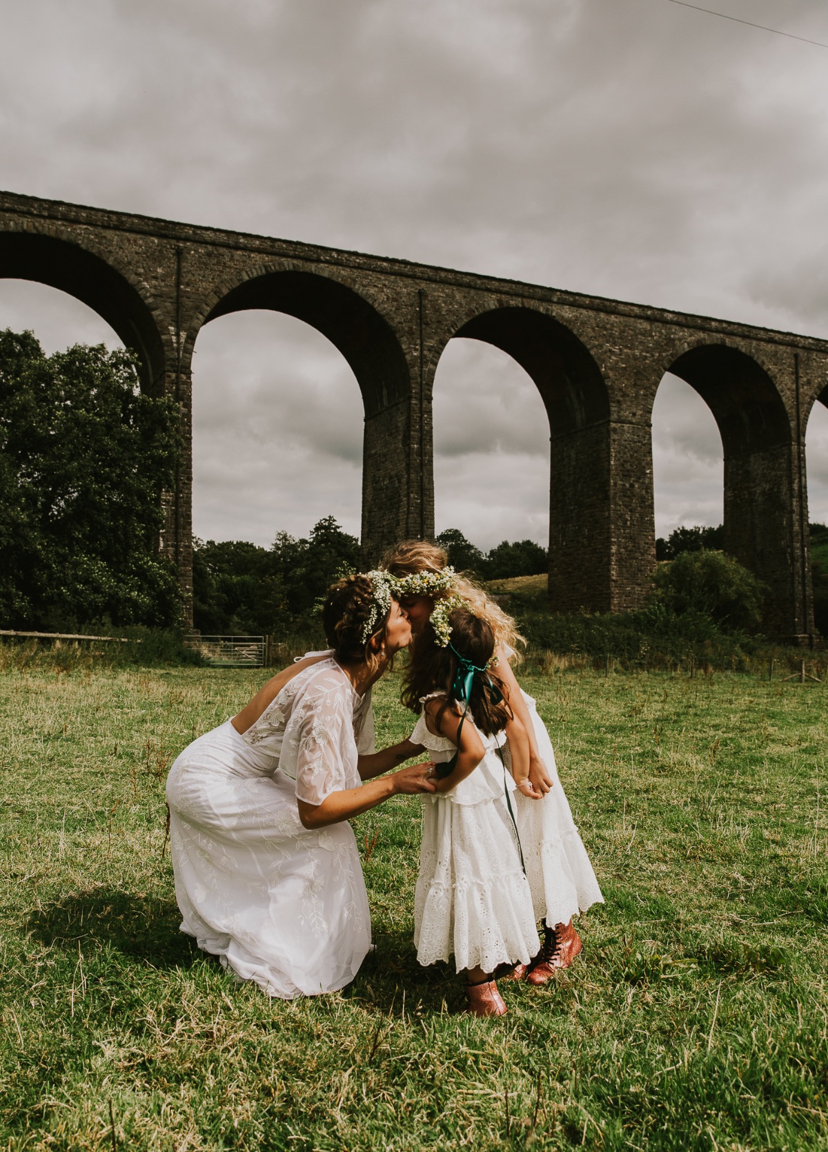 the beautiful flower girls with their mummy