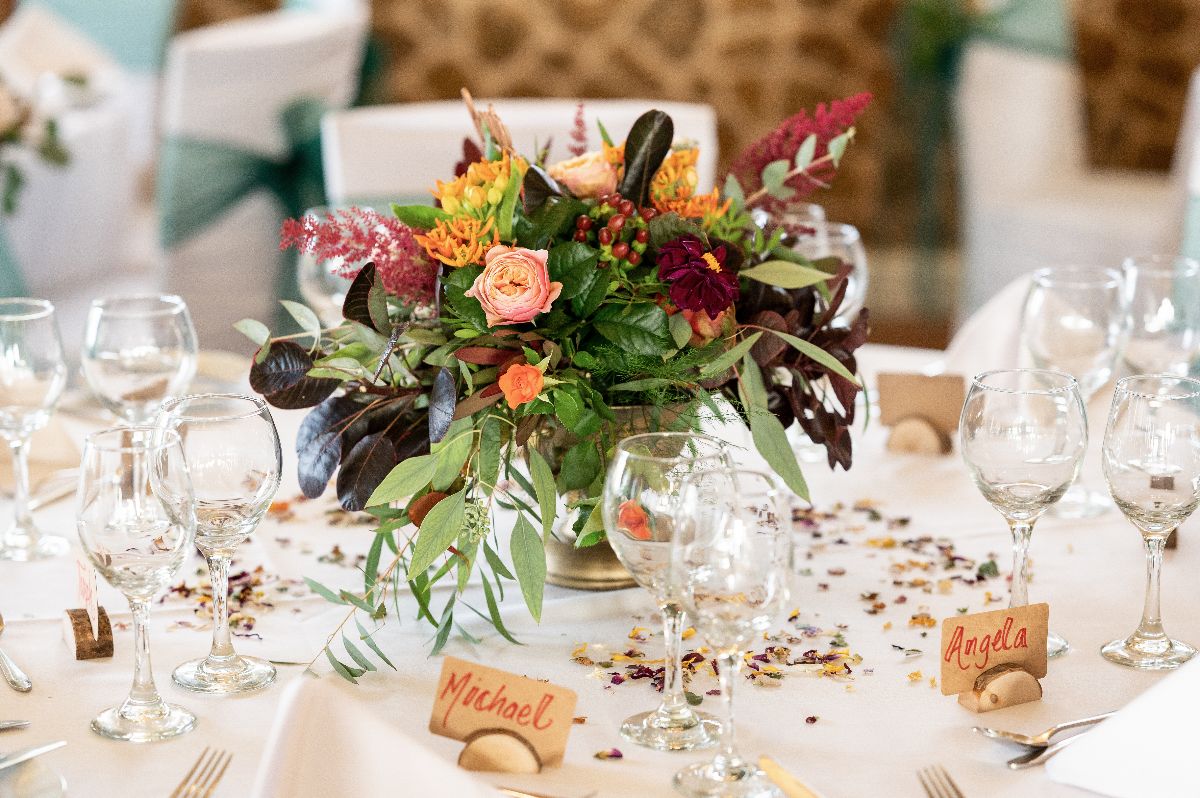 Gorgeous Autumnal colours were chosen along with rustic wooden place name holders and hand dried flowers.Swaffham and Fakenham florist