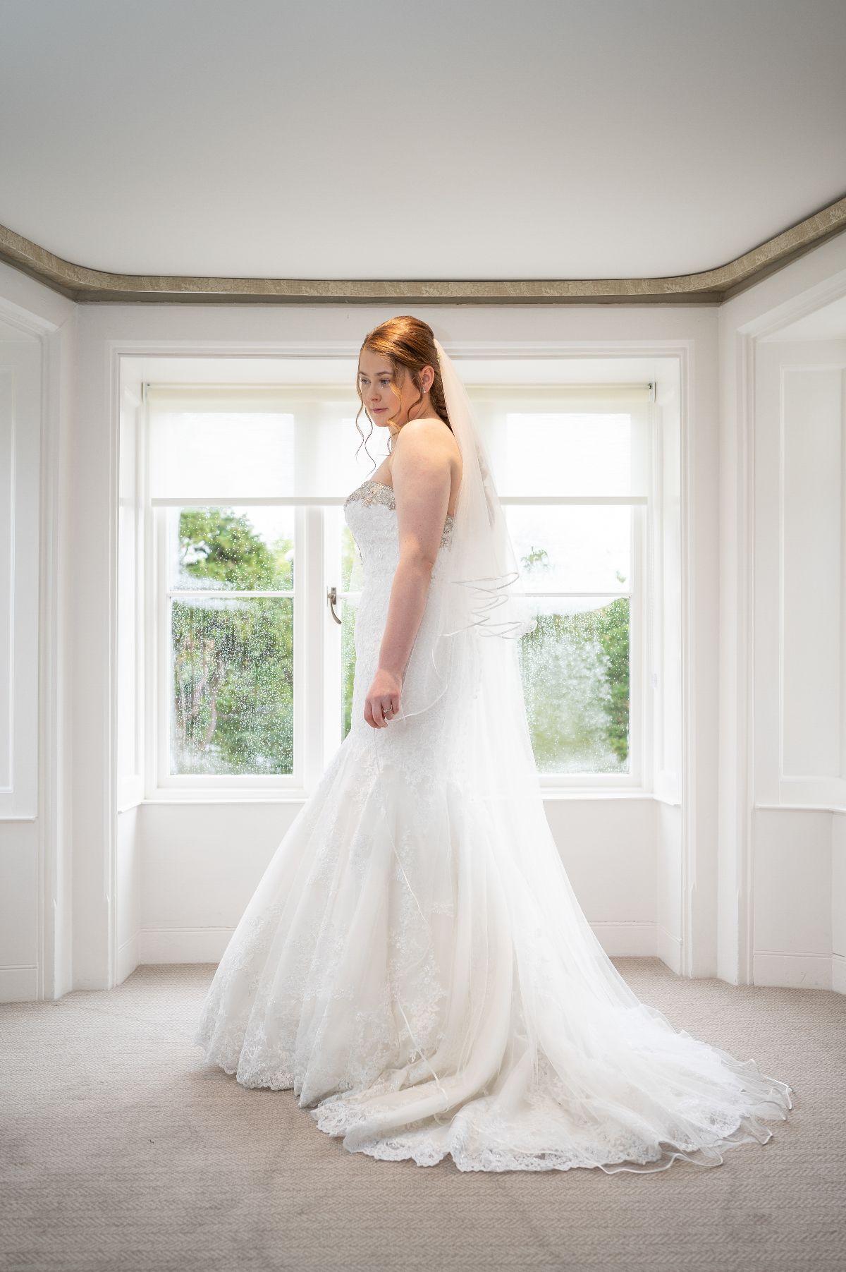 the all so important wedding dress shot, taking in the Manor suite Bay window