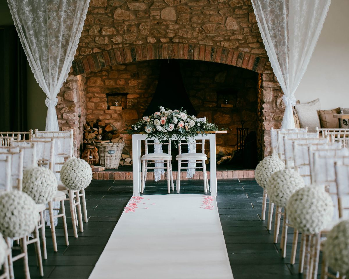 Quantock Barn for your ceremony with 80 to 250 guests. 

Florist: Twigs & Twine (twigsandtwineflorist.co.uk)

Venue Decor: Once Upon a Table Events