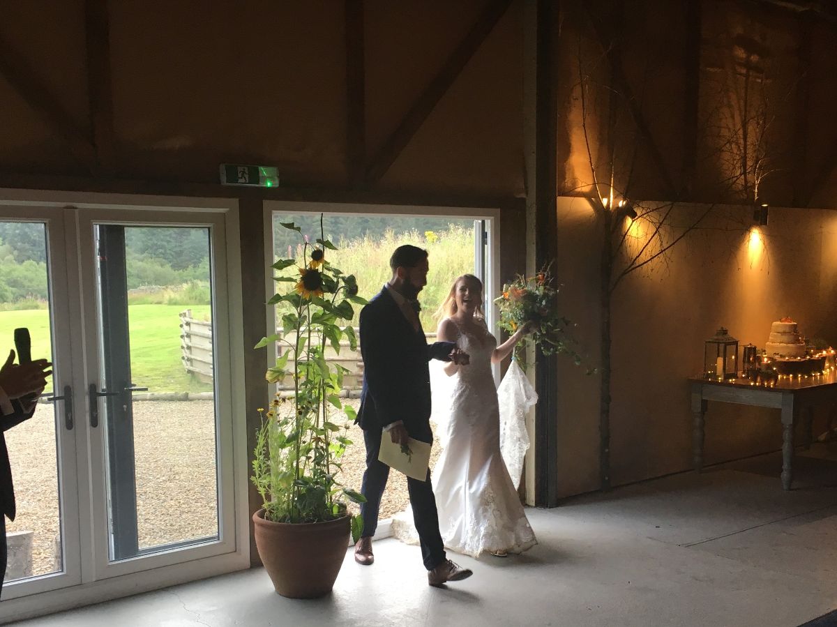 The newly weds arriving at The Dark Skies Wedding Barn