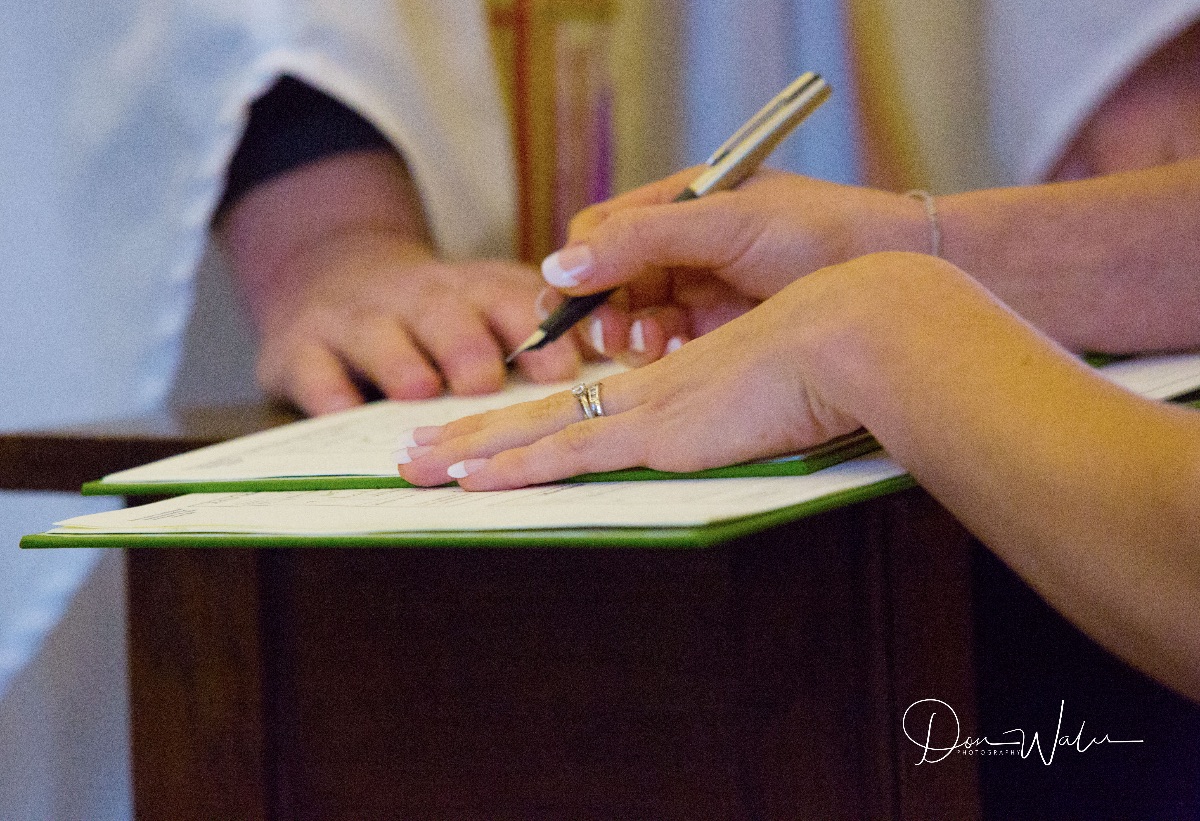 Signing the Register 