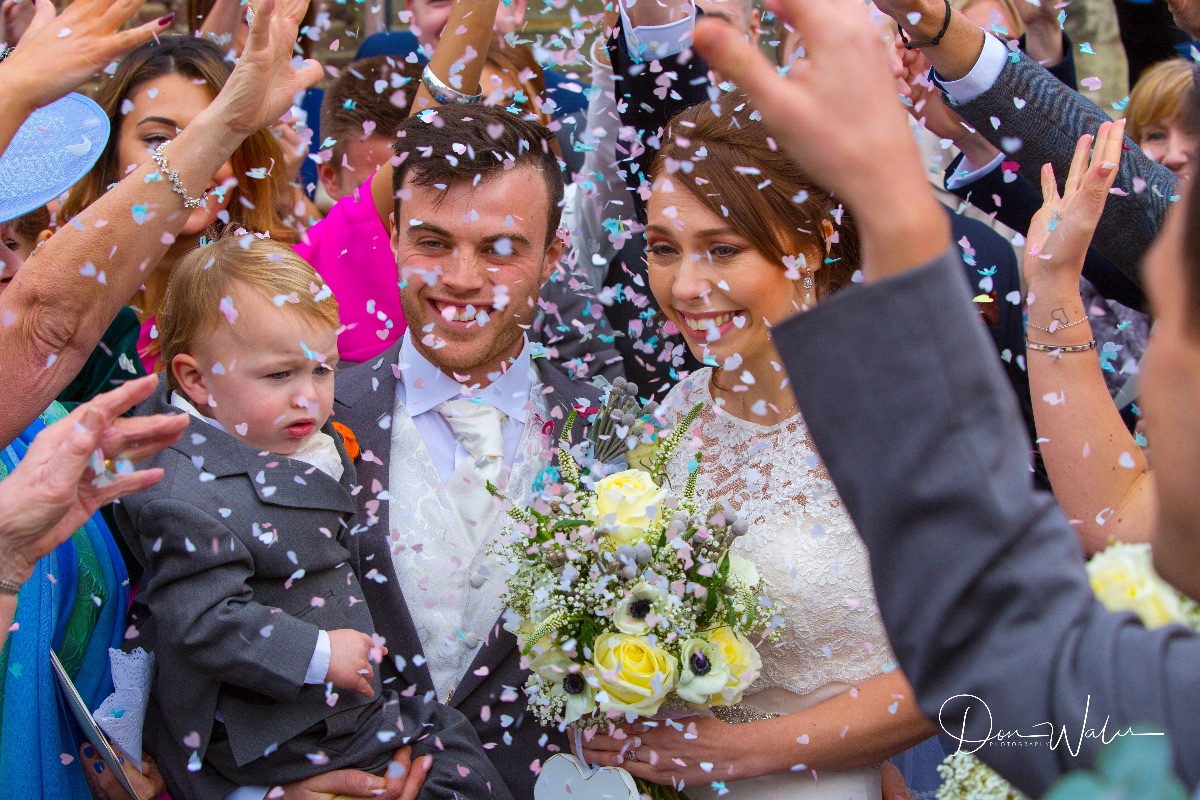 Stephanie And Tom at St.Nicholas church Shepperton and confetti time