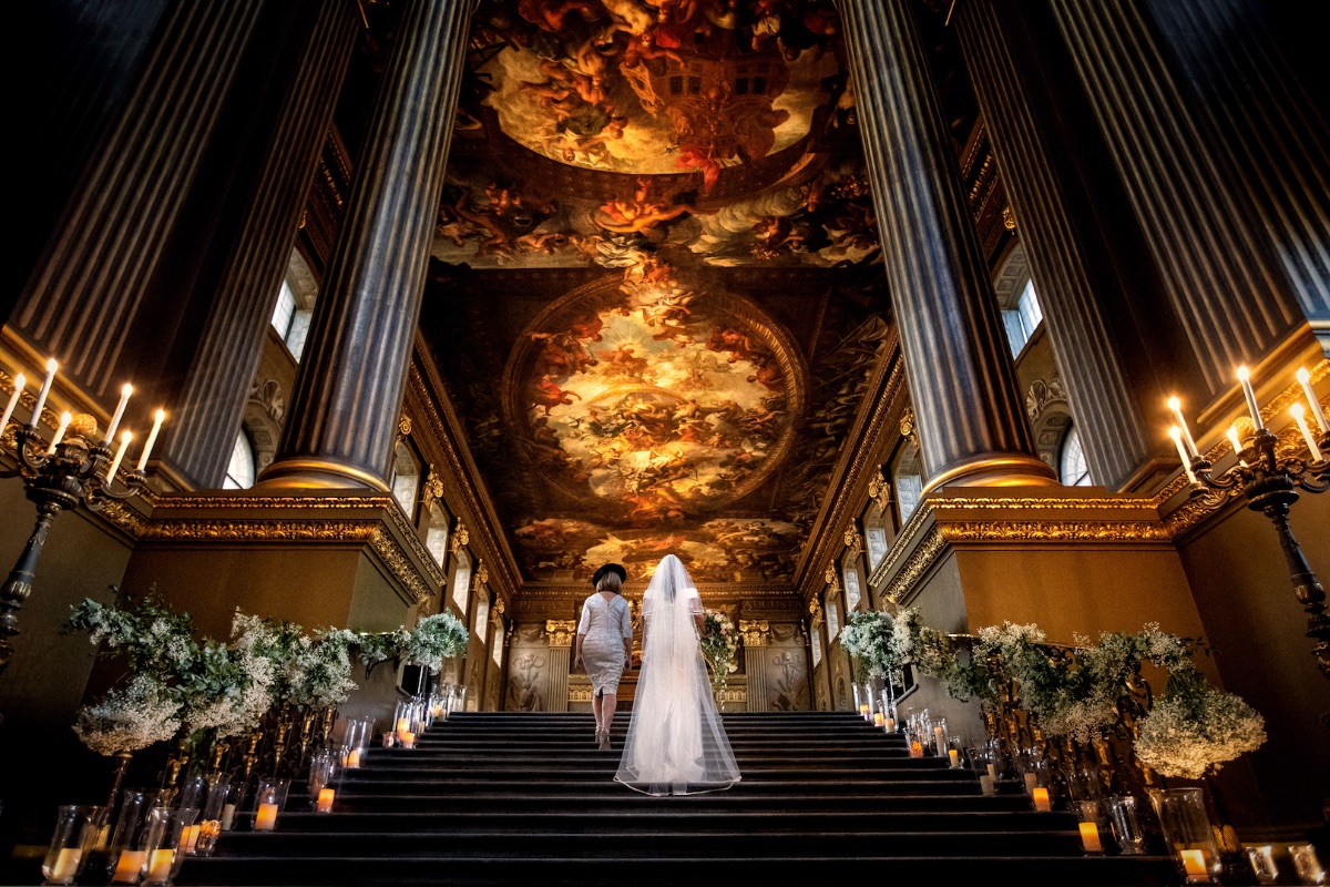 Jenny heading up the great stairs in the painted hall, only aa few minutes away marrying the love of here life.