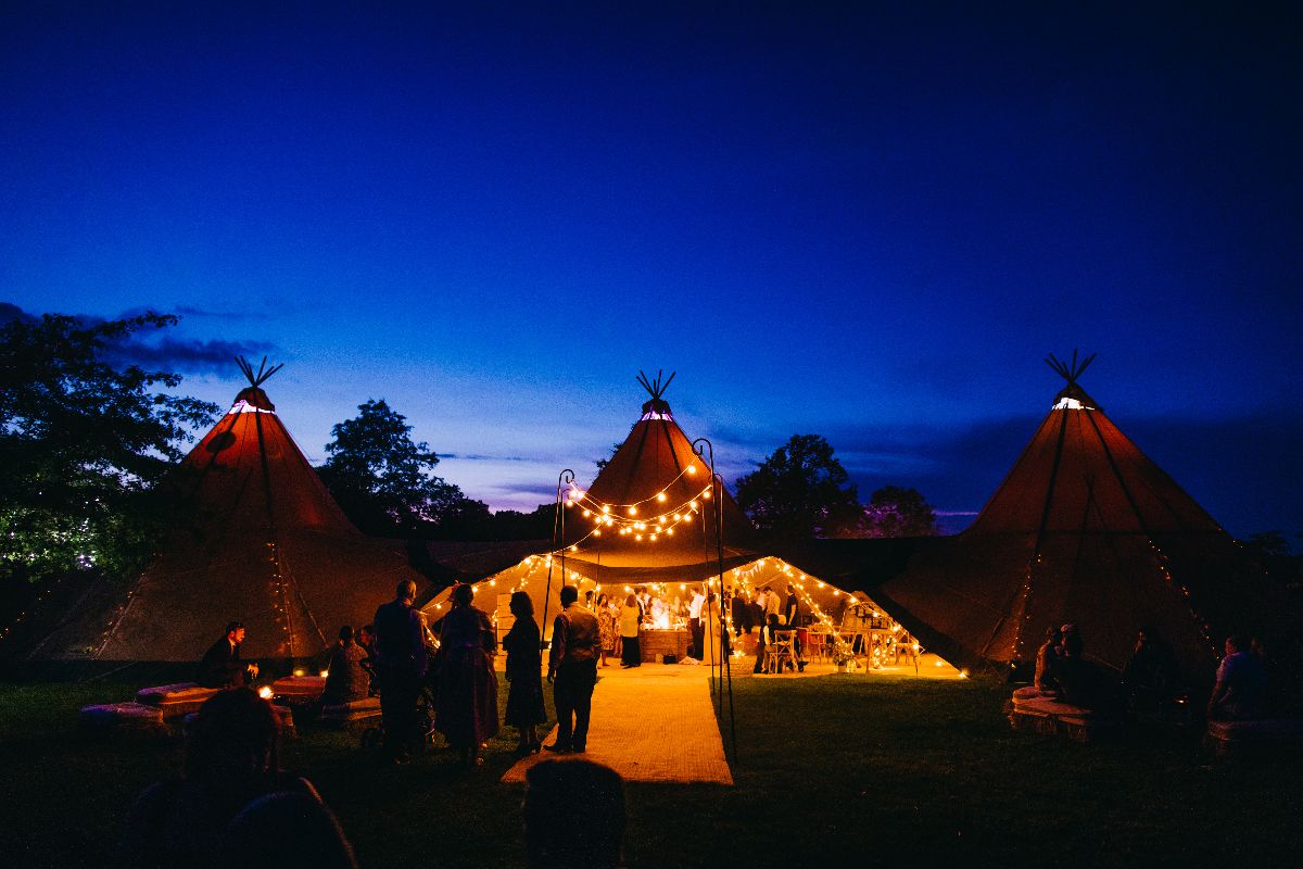 Sarah and John Partied in to the night in three giant hat tipis at Bawdon Lodge Farm, Leicestershire.