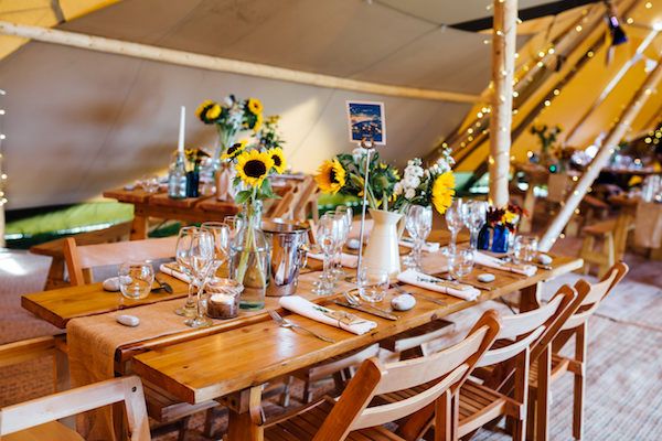 Nordic Pine Tables with chairs, decorated beautifully by the bride and groom