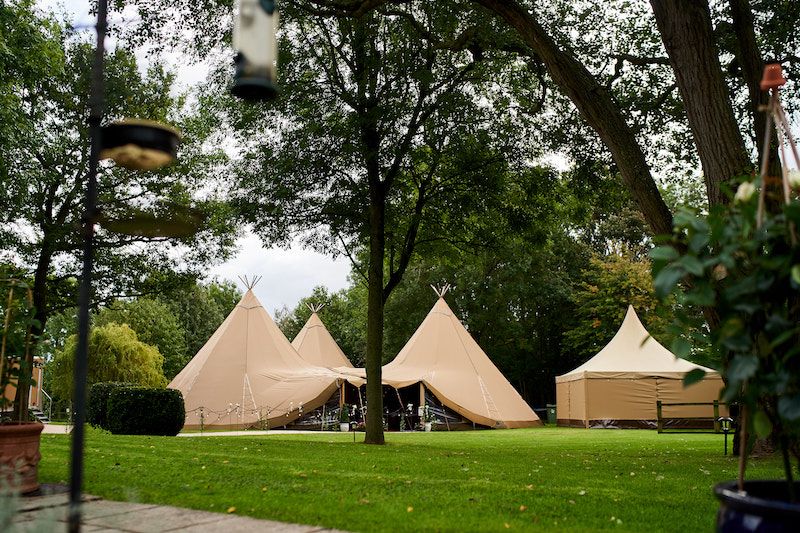 Three Giant Hat Tipis in Francesca and Mat's family garden