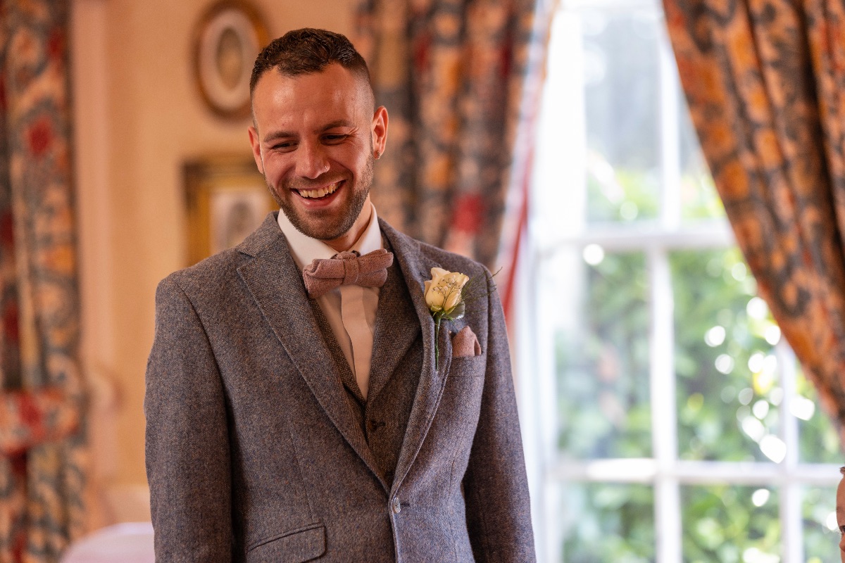 The groom waits...