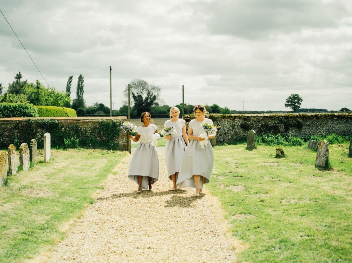 Bridesmaids arriving at the church