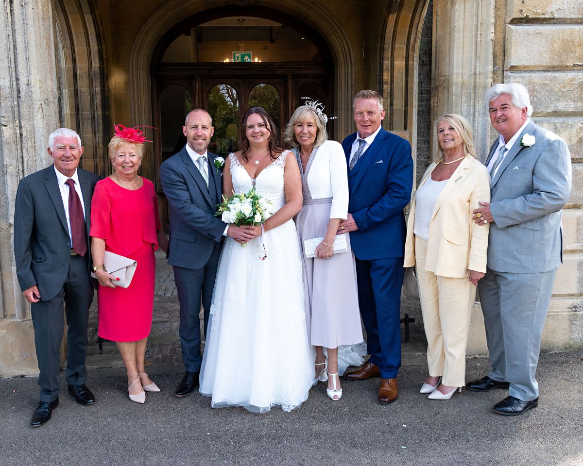 The happy couple with mums and dads