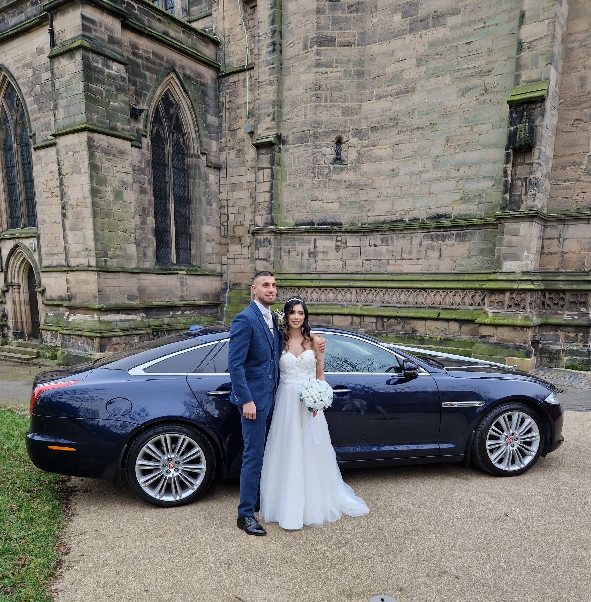 The happy couple pose for photographs.