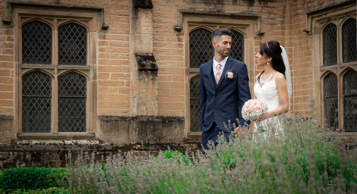 Taking a stroll, bride and groom