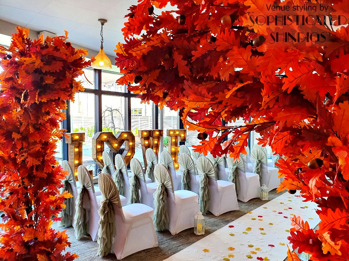 View down the aisle, through our striking autumnal arch.