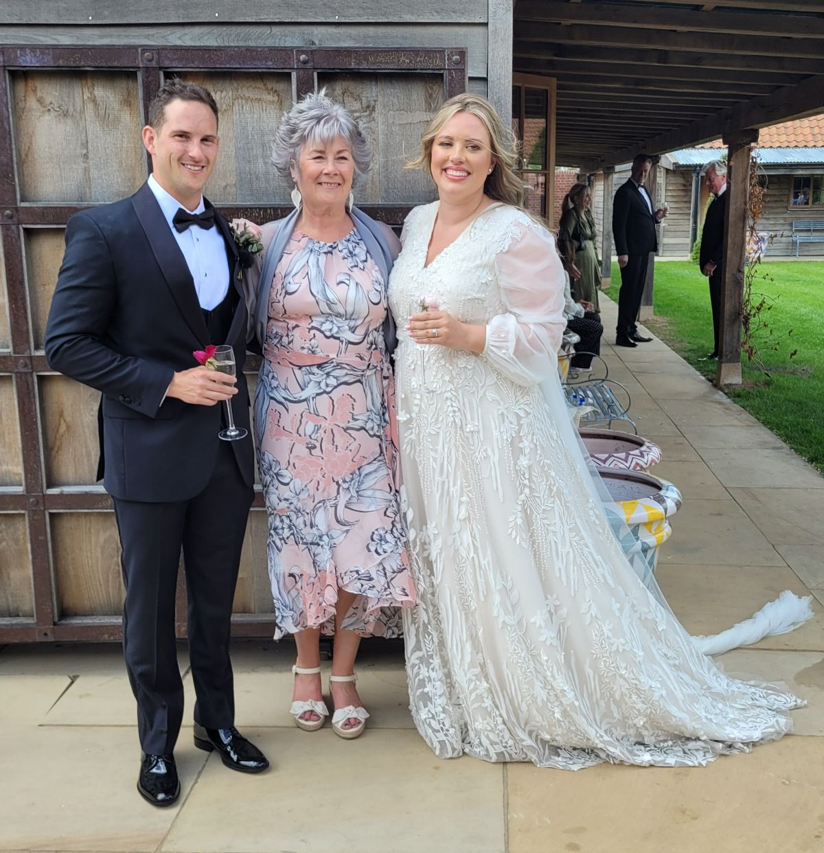 Happy Suffolk Celebrant with couple
