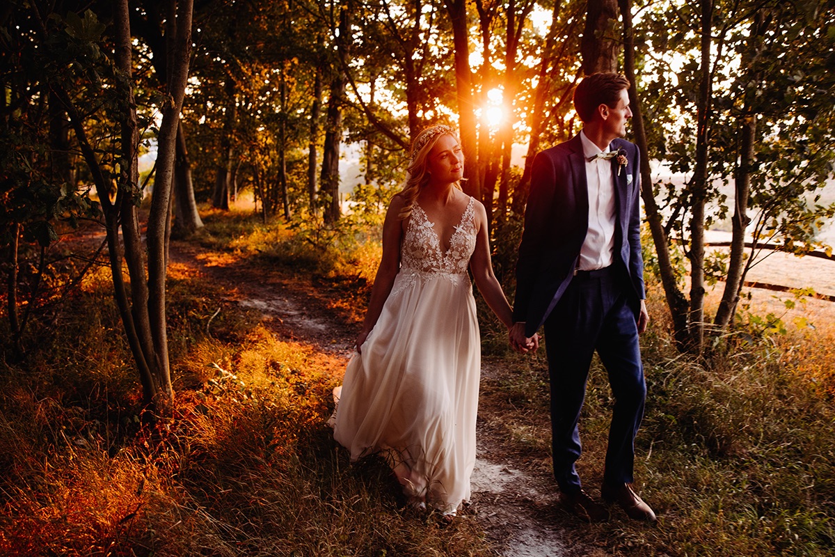 Charlotte and Cal together at Cissbury Barns in the golden hour.