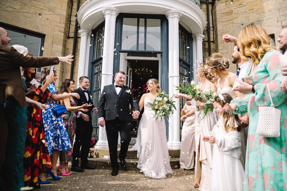 Sam & Cara exit Carr Bank Wedding Venue Mansfield Nottinghamshire as guests throw confetti
