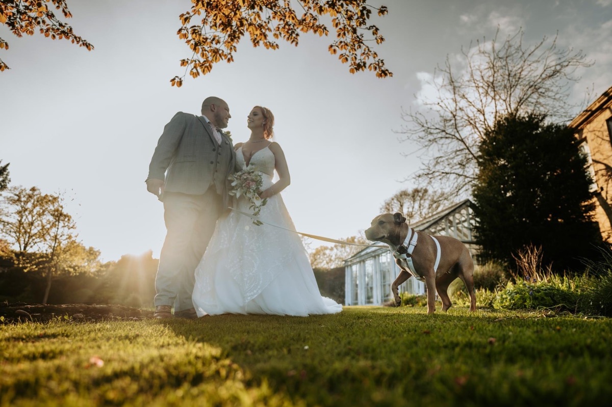 Jennifer & Dave with their dog in the Carr Bank grounds at Carr Bank Wedding Venue Mansfield Nottinghamshire