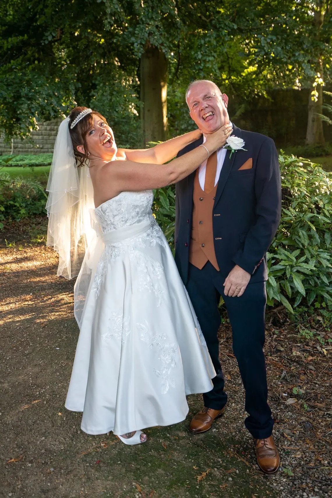 Nicola & Mark having fun and laughs in Carr Bank Park grounds at Carr Bank Wedding Venue Mansfield Nottinghamshire 