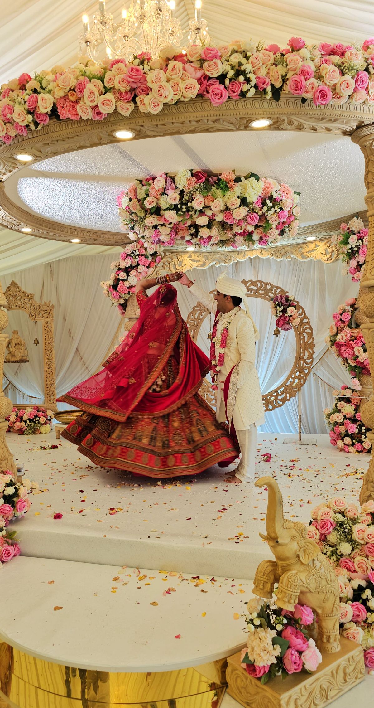 Bride and Groom in the stunning Mandap in the Pavilion at North Mymms Park