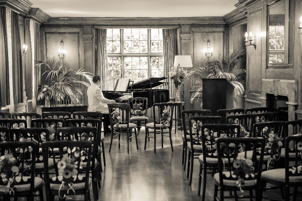 Warming up the piano before the arrival of guests.