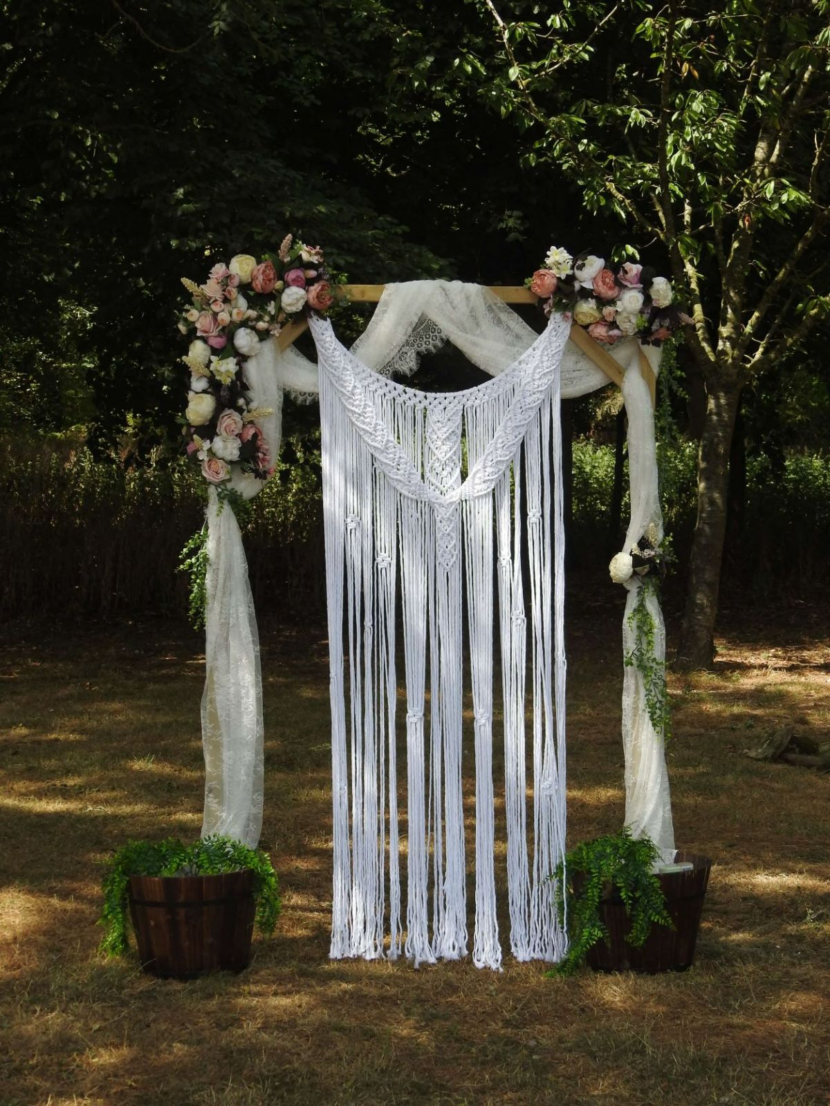 Brides homemade flower arch for the celebrant led ceremony