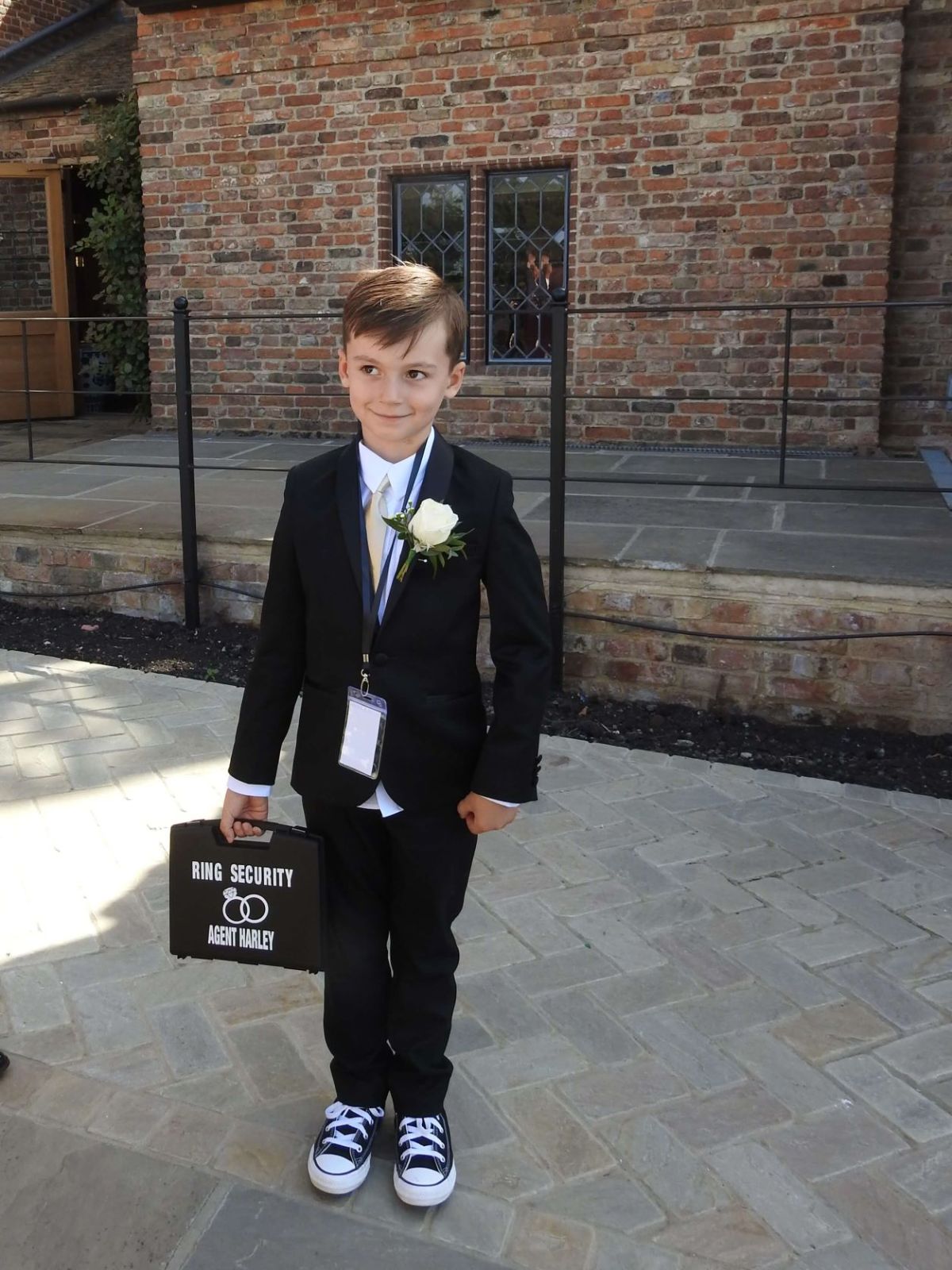 This young man, stole the show when he delivered the rings in the ceremony in his security case 