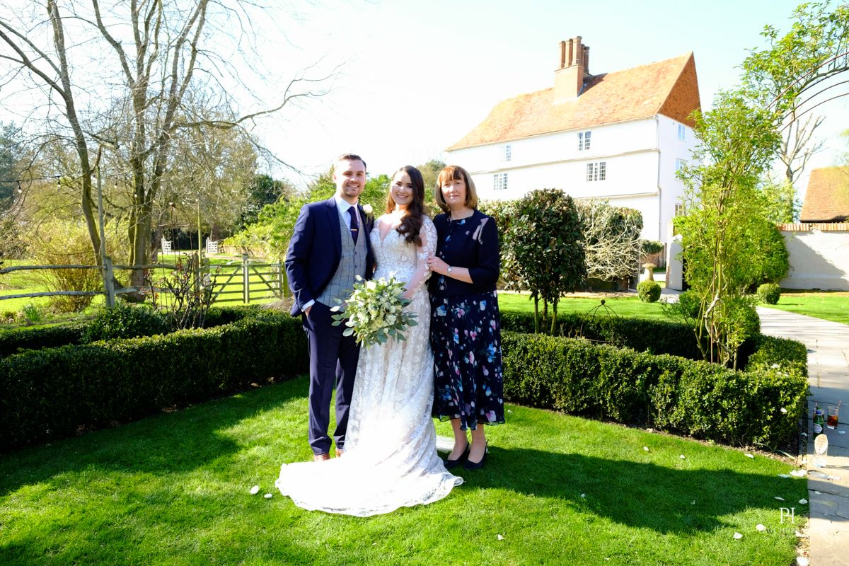 Danna, Luke and the Celebrant Carol after the ceremony 