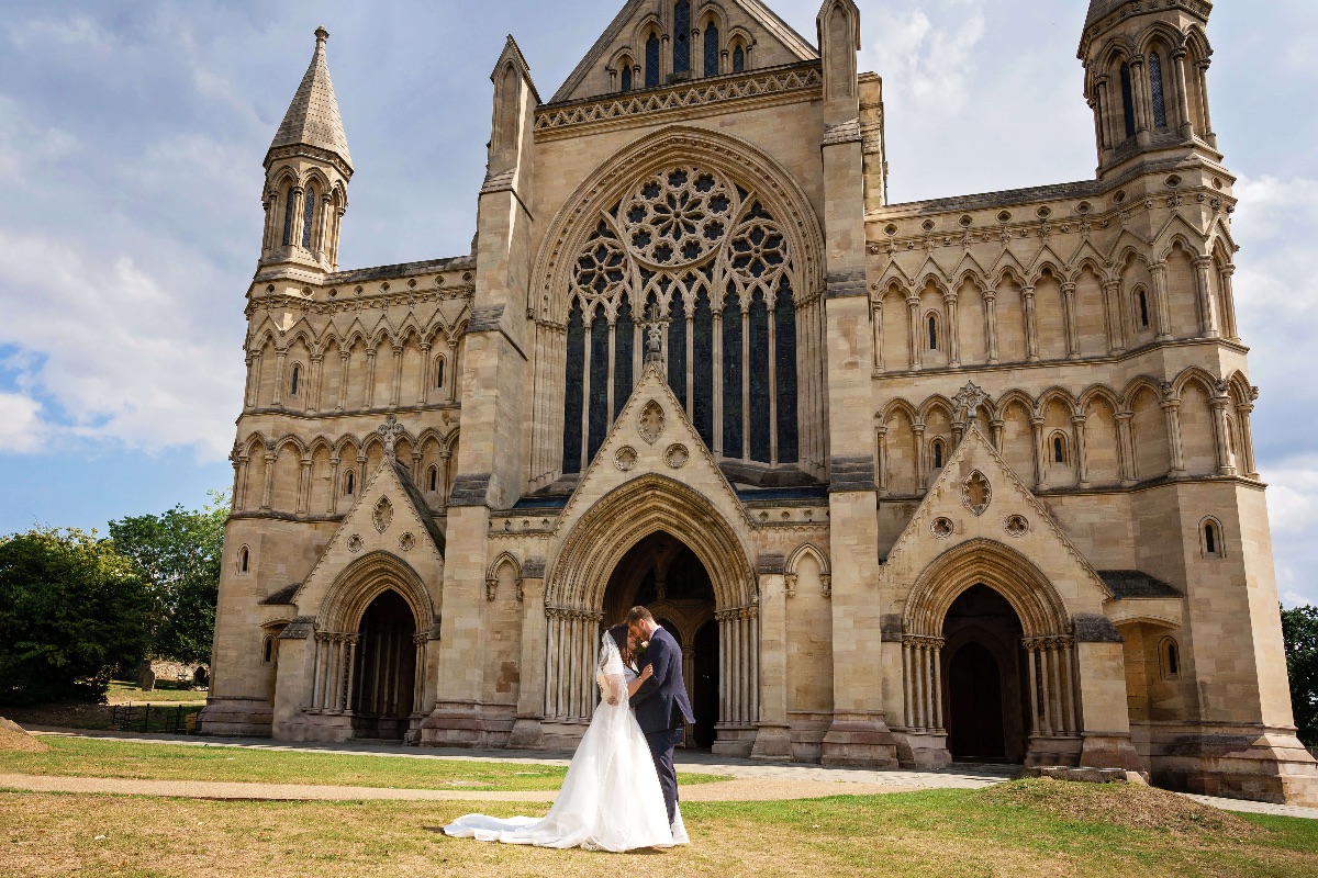 Wedding photograph outside the front of St Albans Cathedral.