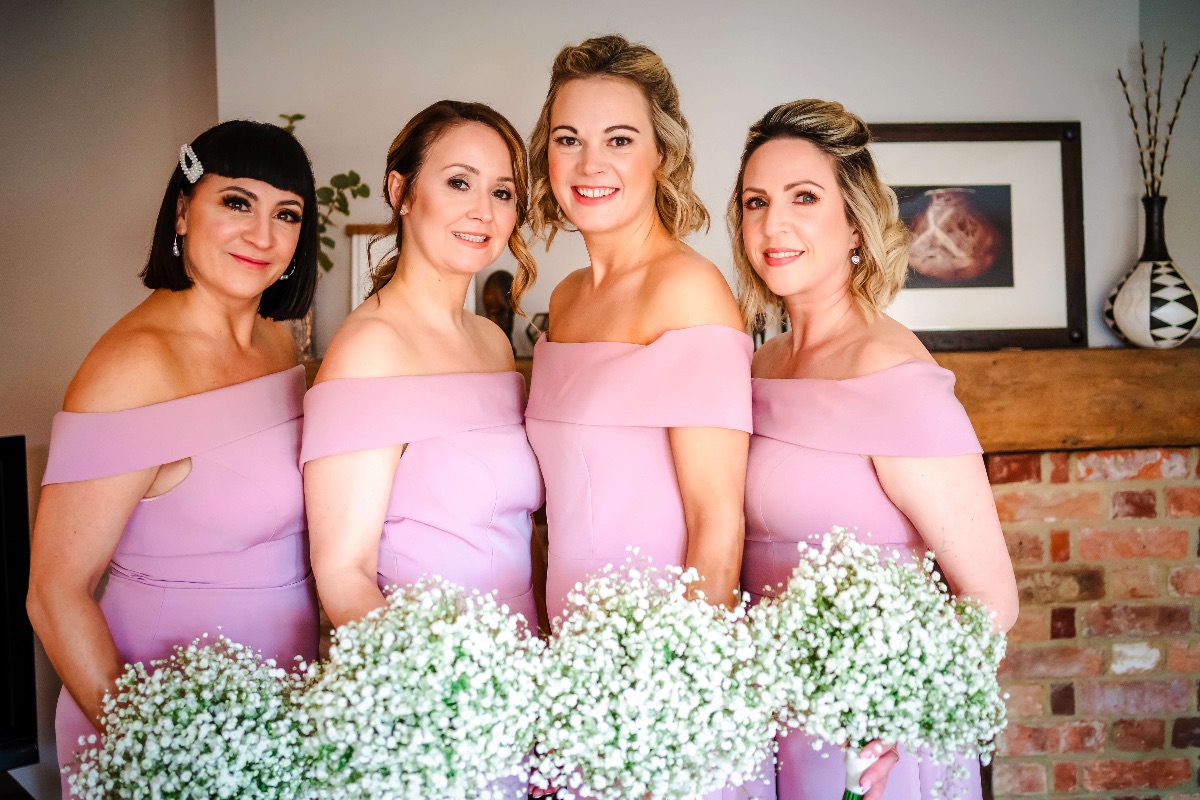 Four beautiful bridesmaids dresses in pink