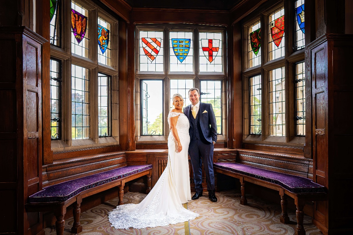 Bride and son enjoy this moment during the bridal prep at Fanhams  Hall