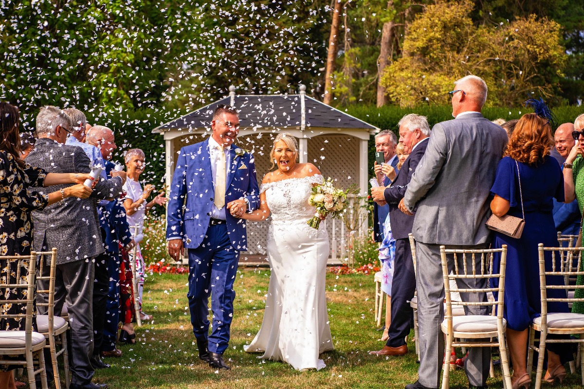 This couple had confetti bombs with created an amazing photo and had the guests all laughing