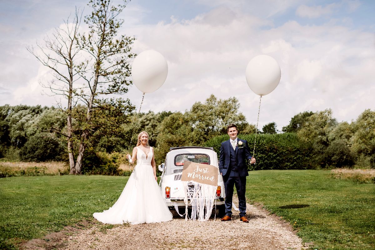 Happiness is a little fiat500 & massive white balloons on your wedding day
