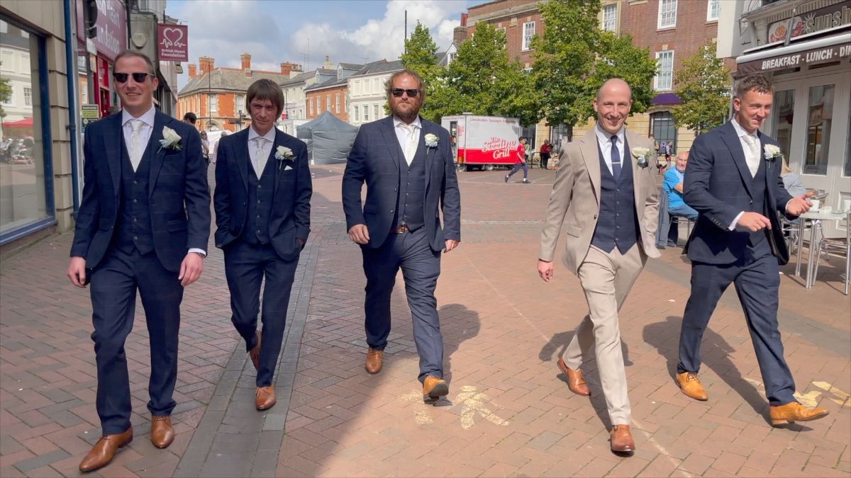 Andy and his grooms party make their way to the Church