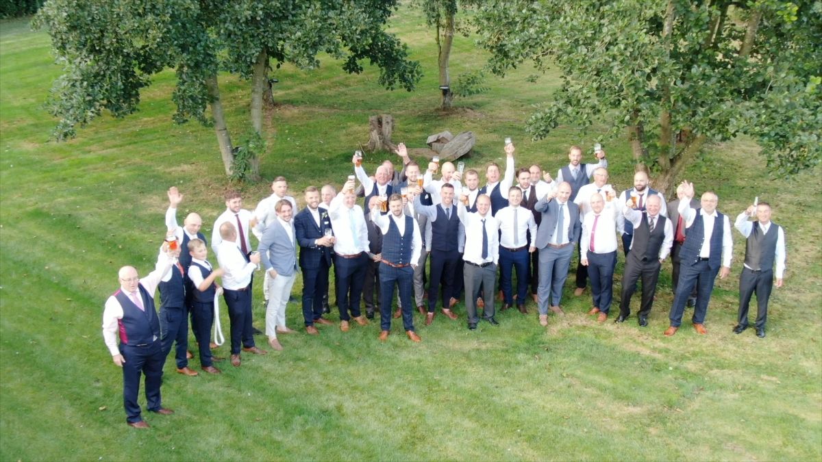 The groom and his party raise a glass