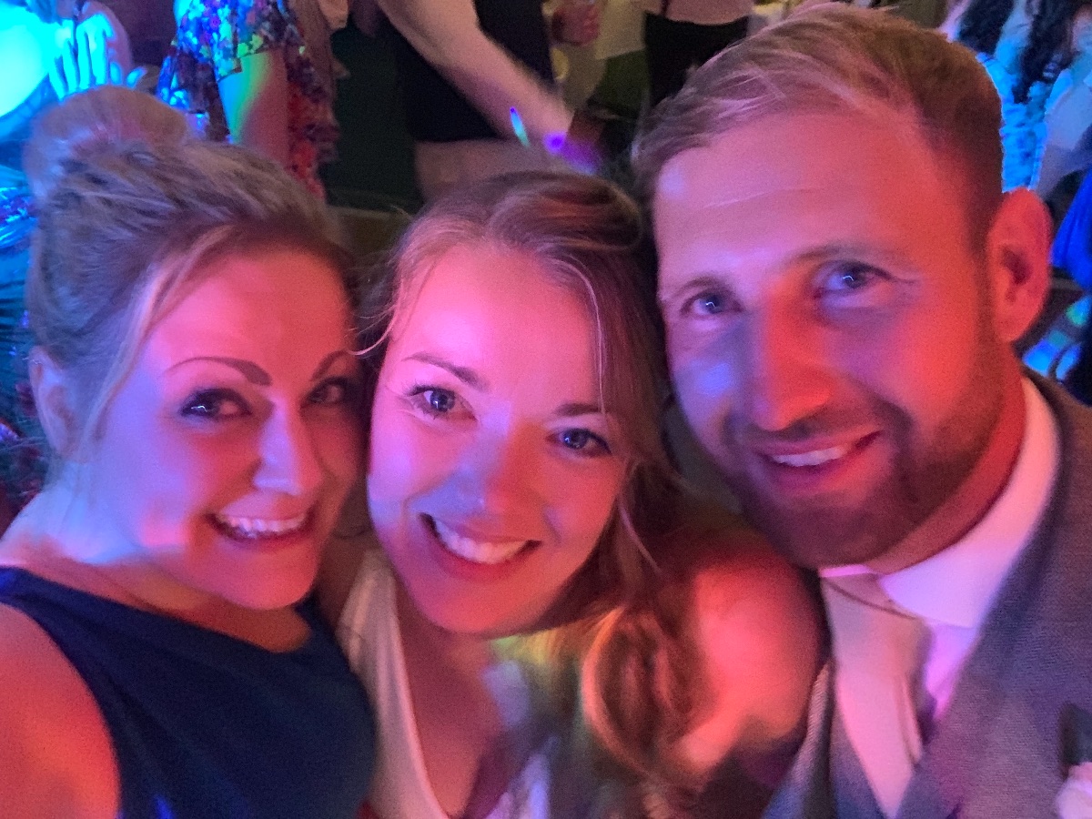 Selfie time - our lead singer with the bride & groom!
