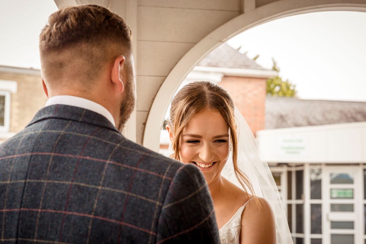 Smiling Bride in her wedding ceremony at Glenfield Registry Office Leicester