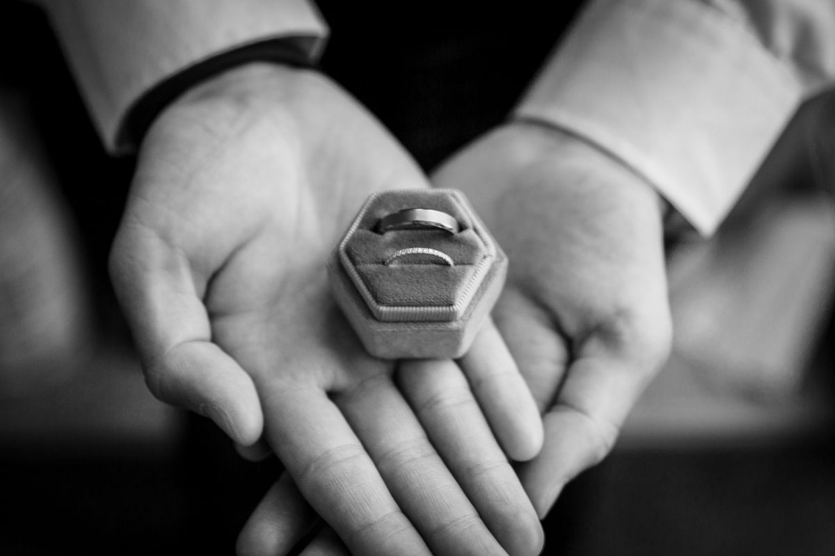 The Best Man holds the wedding rings in a stunning vintage ring box by Etsy