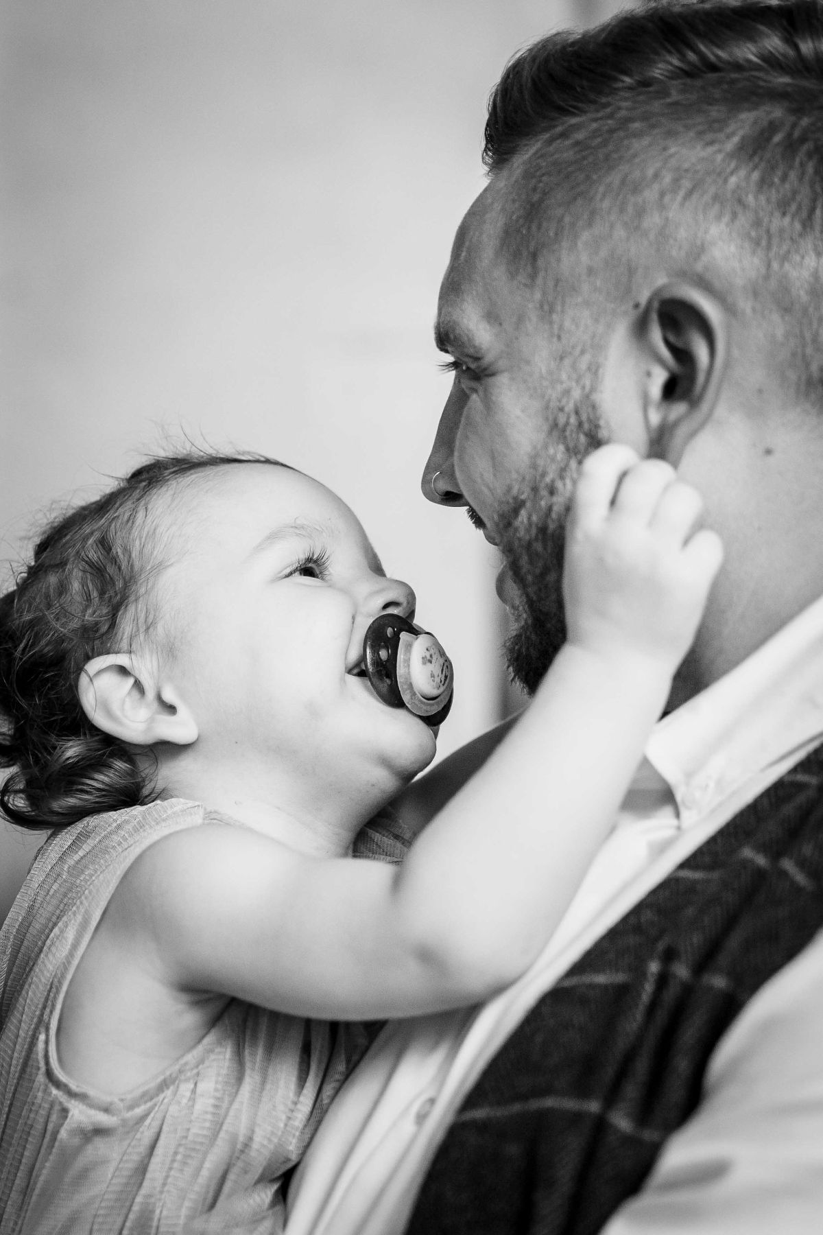 Groom sharing a moment with his daughter at The Factory Hinckley