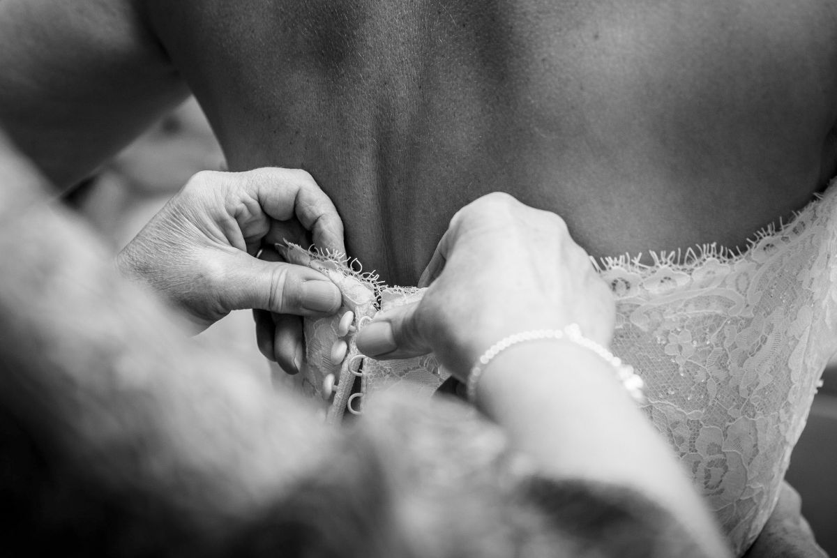 Mother-of-the-Bride helps with the Bride