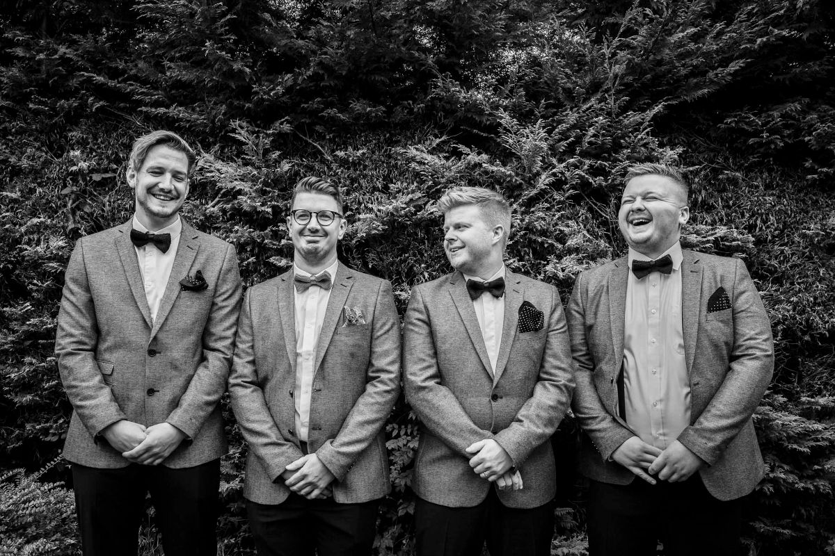The Groom and his Men laughing on his Wedding Day
