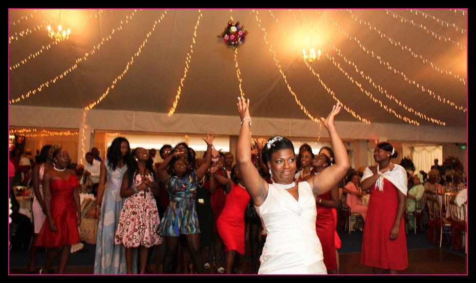 The Nigerian Bride throwing her bouquet