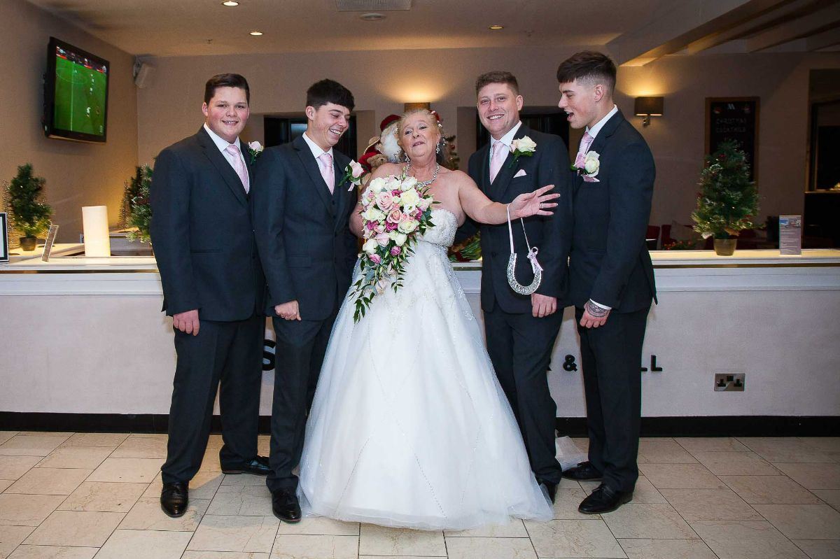 The Bride with the Groomsmen. 