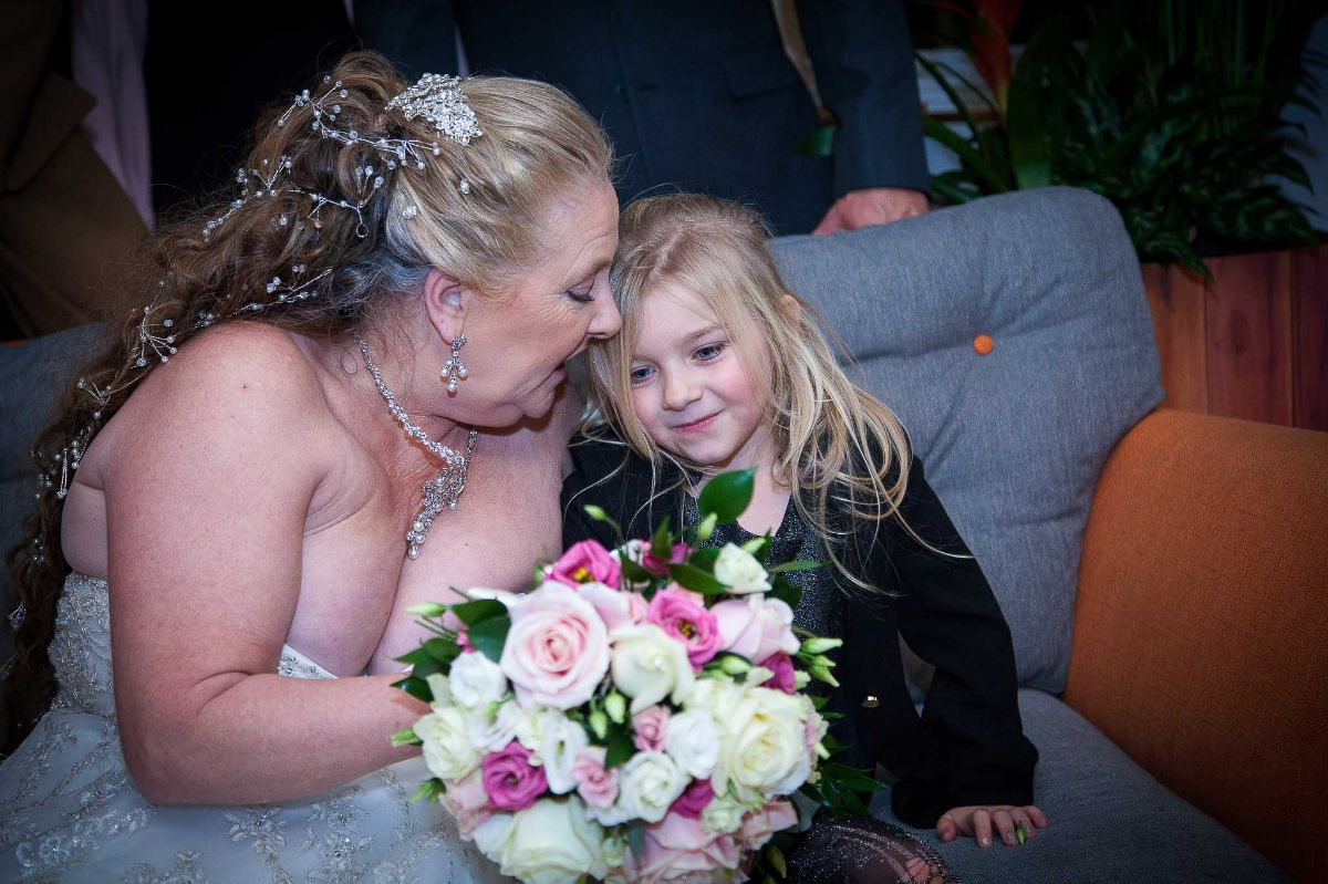 A sweet moment between the Bride and a young guest. 