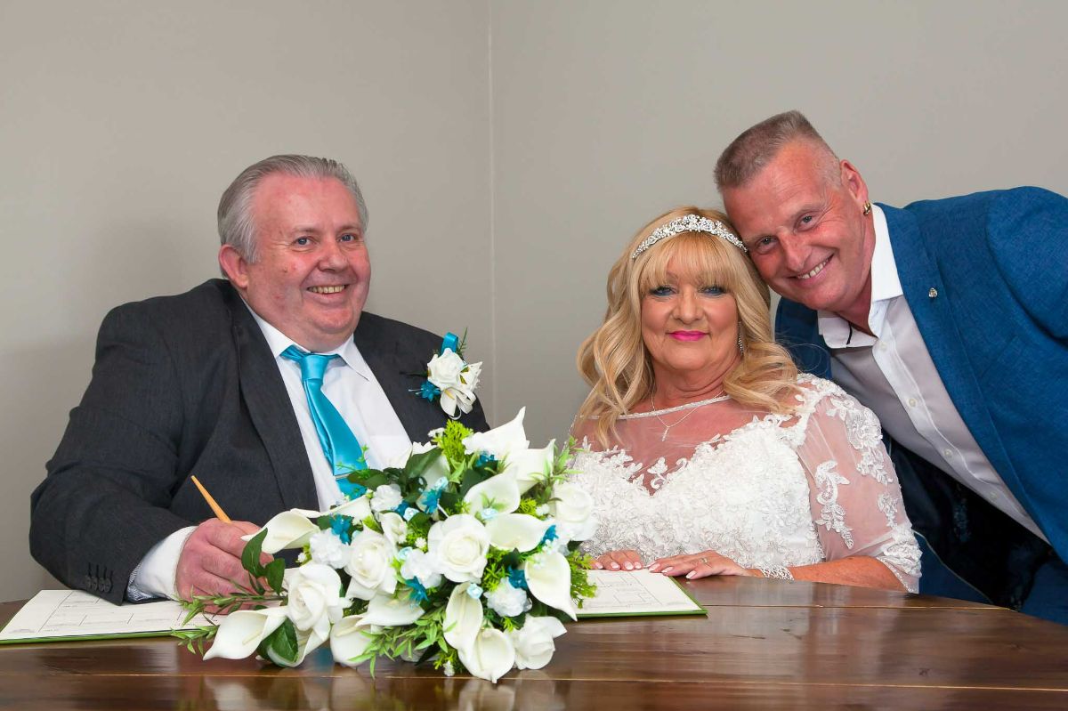 Photobomb!! A moment between the Bride and her brother.