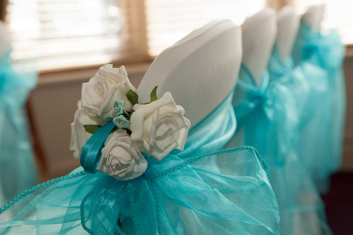 Beautiful aqua-coloured sachets with floral decorations. 