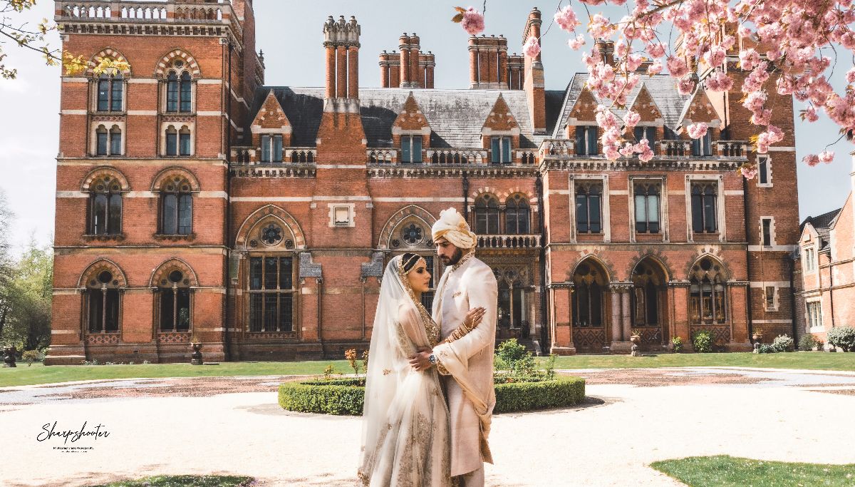 Anika & Sachin in front of the Renaissance at Kelham Hall